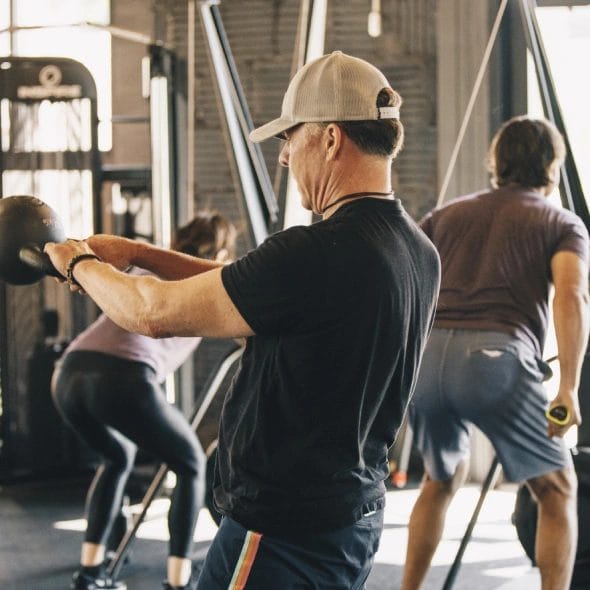 man hold kettlebell at Badger Strength